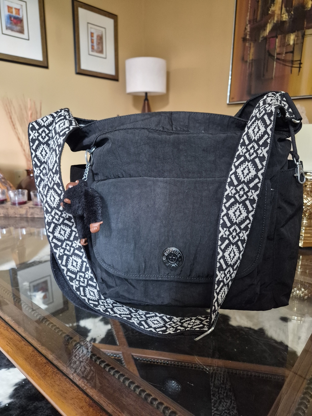 Kipling Black Crossbody Bag with Black-and-White Patterned Strap
